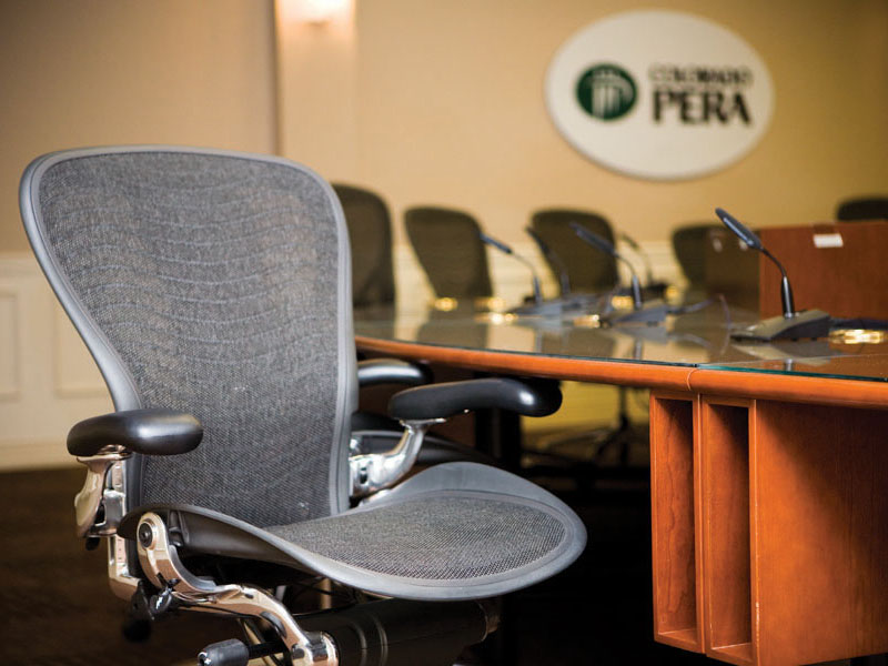 A view of empty chairs in the Colorado PERA Board Room.