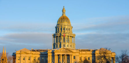 A winter sunset view of Colorado State Capitol Building in Downtown Denver.