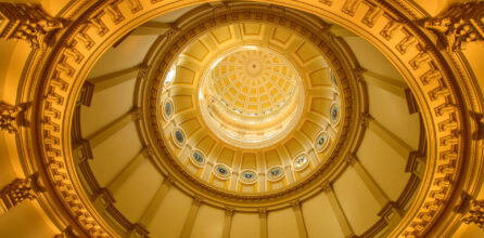A close-up inside view of gold dome of Colorado State Capitol Building.