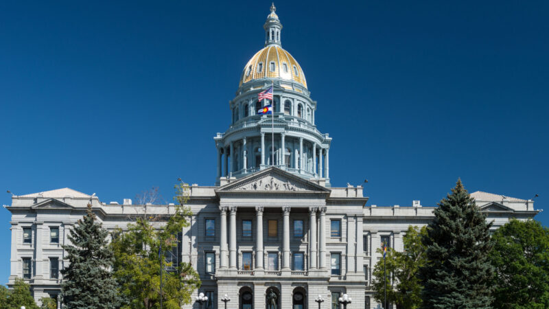 A daytime view of the Colorado State Capitol Building in Denver