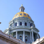 A view of the golden dome atop the Colorado State Capitol Building in Denver